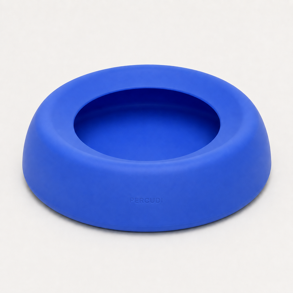 Blue spill-resistant silicone travel water bowl for dogs