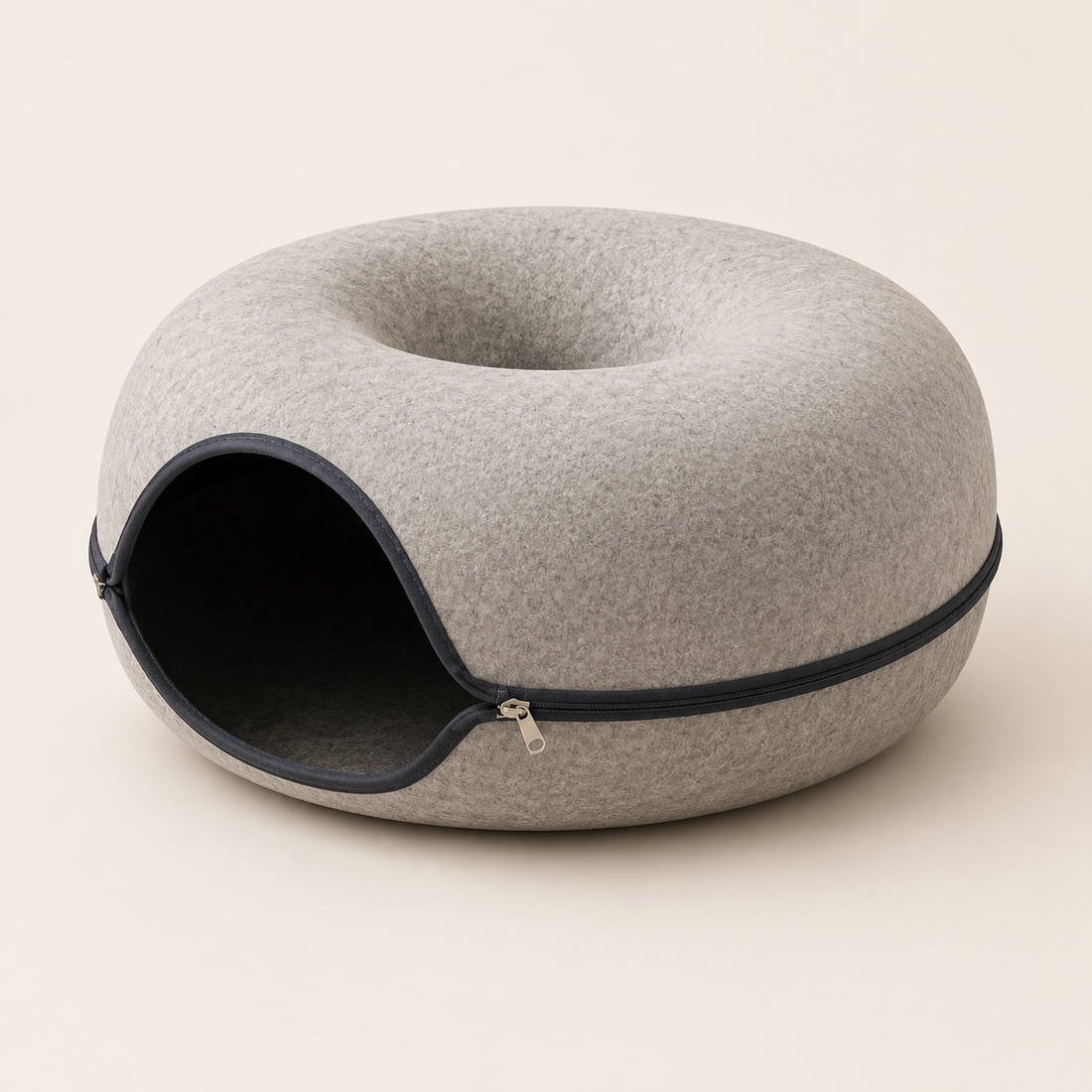 Light gray molded felt donut-shaped cat cave with side entrance
