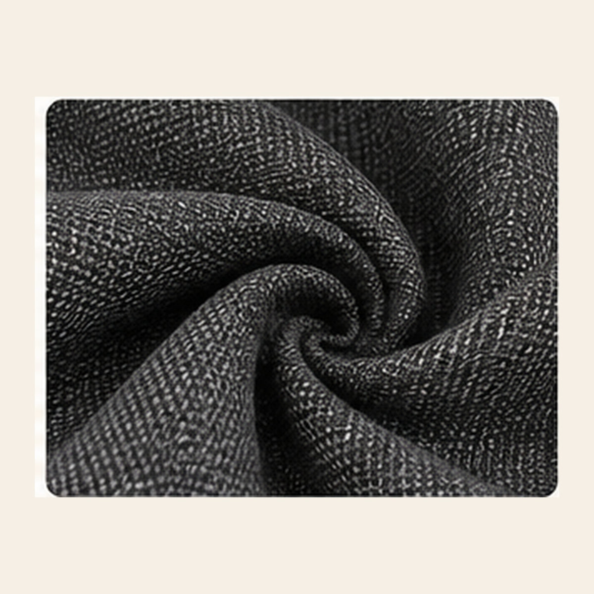 Close-up of charcoal gray scratch-resistant upholstery fabric for pet car seat