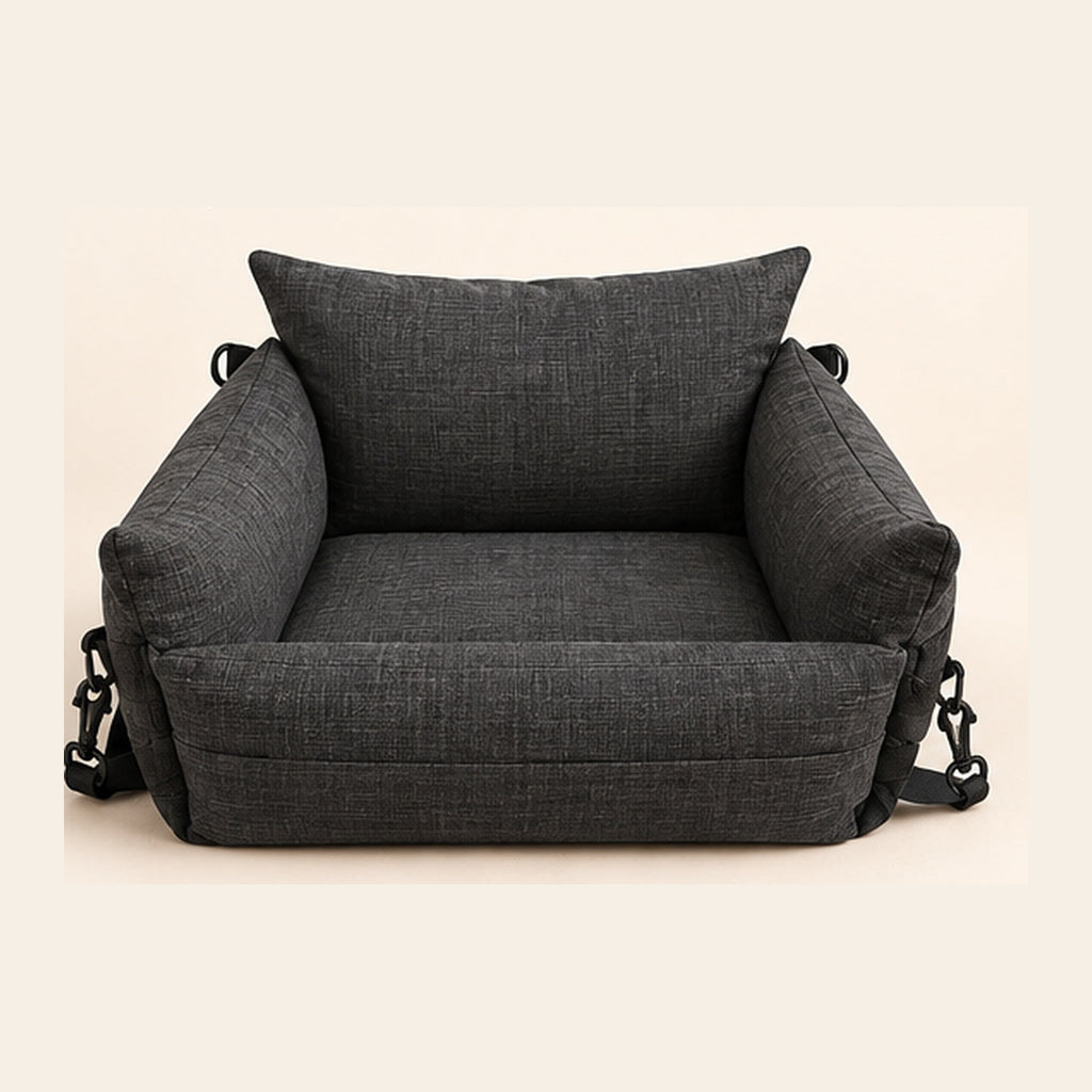 Charcoal gray anti-scratch pet car seat and resting bed on a warm neutral background