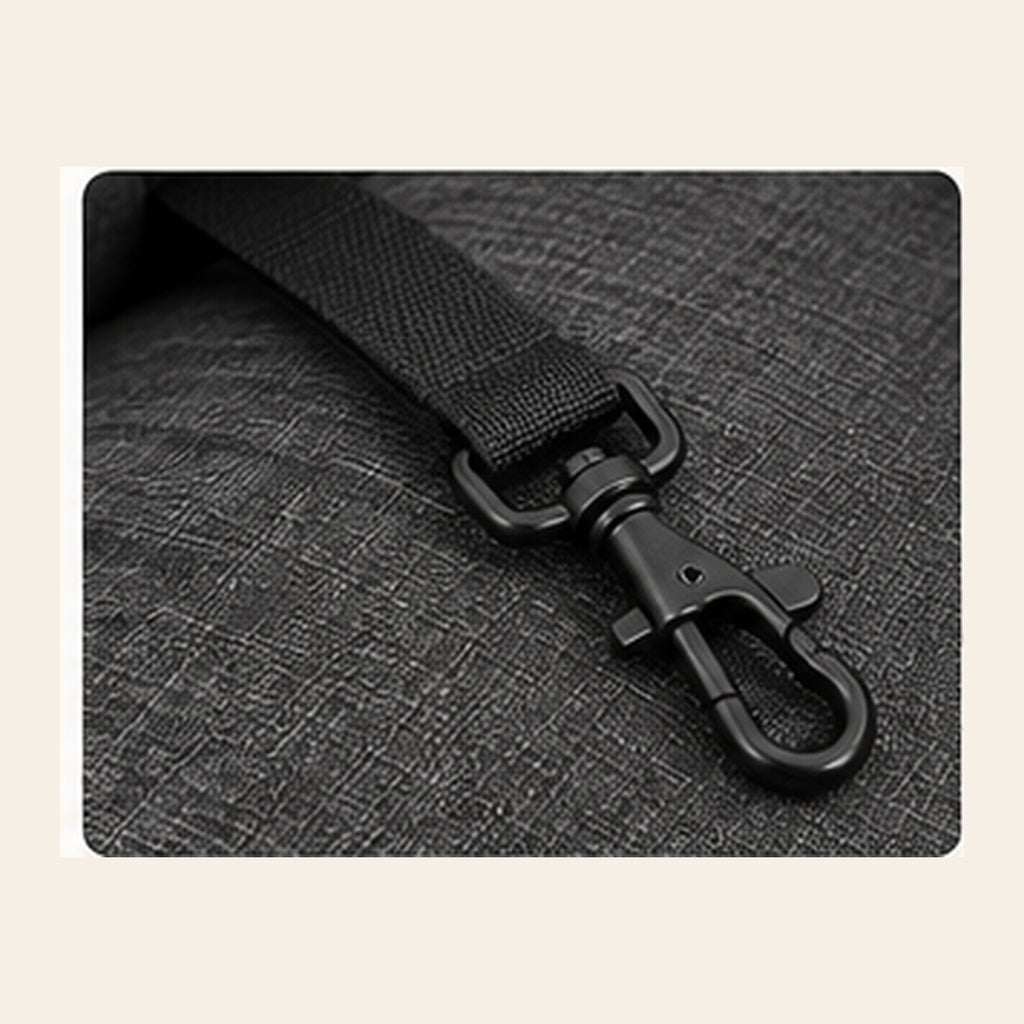Close-up of integrated safety leash and clip inside charcoal gray pet car seat