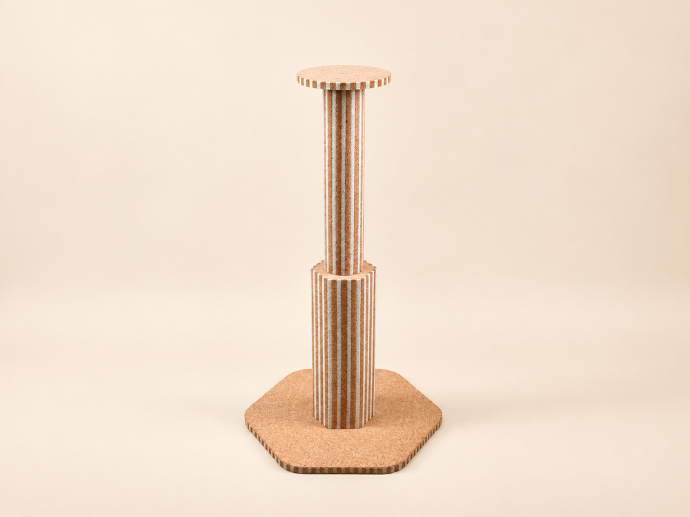 Natural cork double-column hexagon-base cat scratching post on a clean warm neutral background