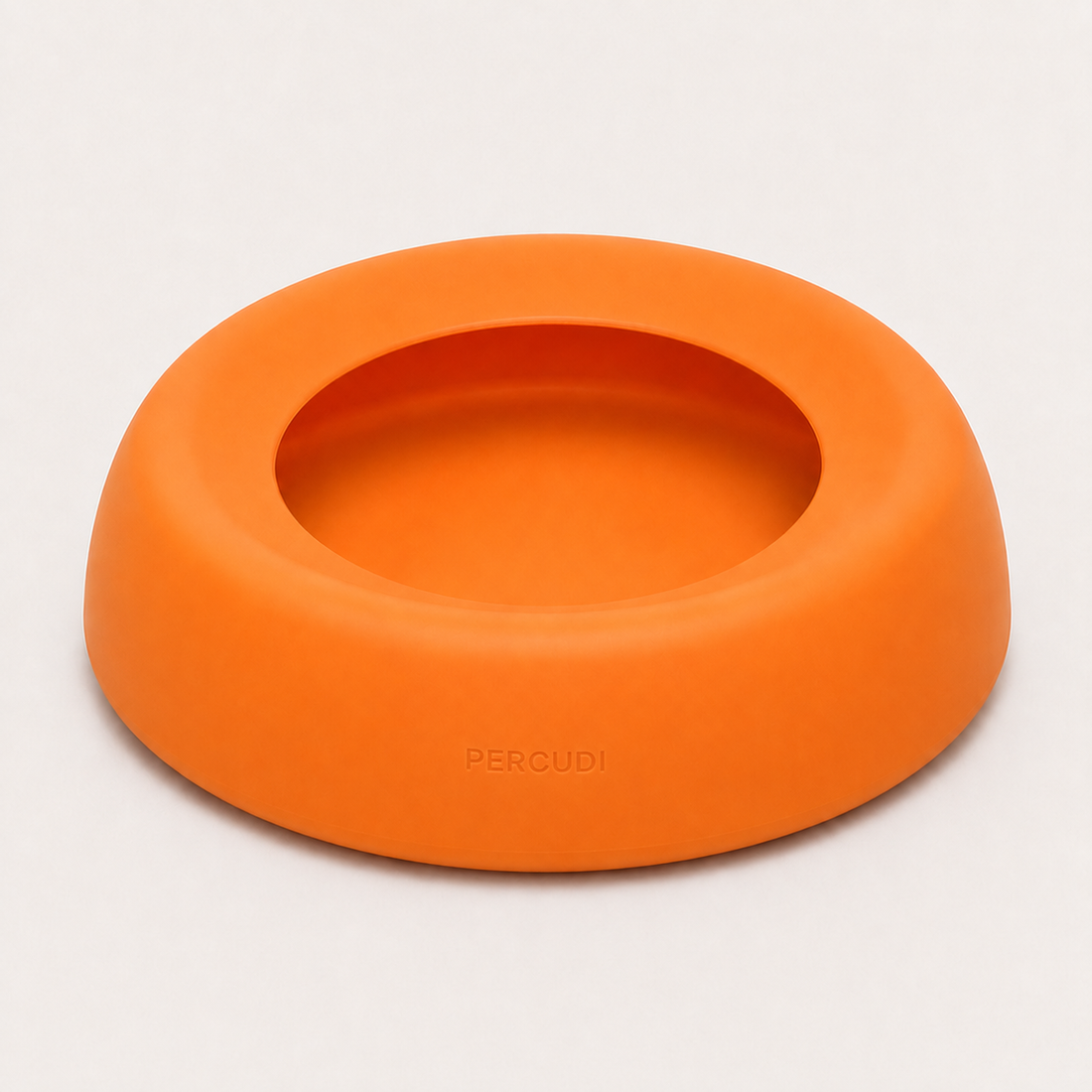 Orange spill-resistant silicone travel water bowl for dogs
