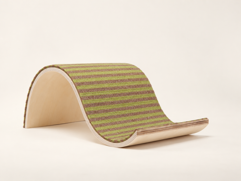 Whale-shaped replaceable felt cat scratcher and lounger with reusable natural wood base on warm cream background